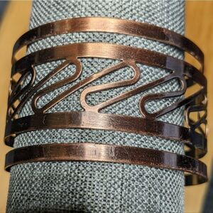 Thin metal light bronze design cuff bracelet